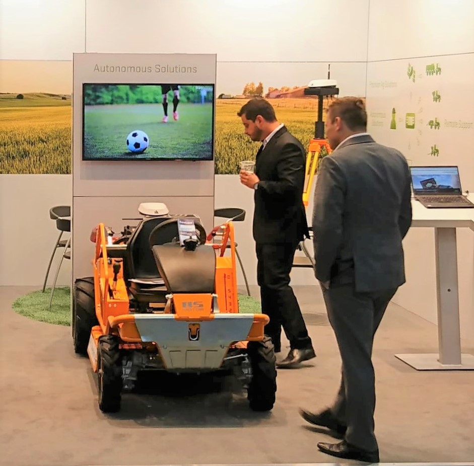 Curious exhibition guests at Agritechnica gathered around AS-Motors slope mower on which SAM is implemented
